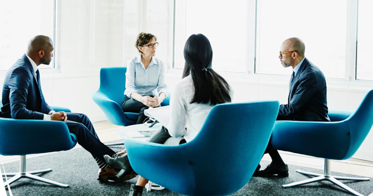 diverse group of employees having a meeting