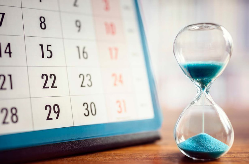 calendar and an hour glass