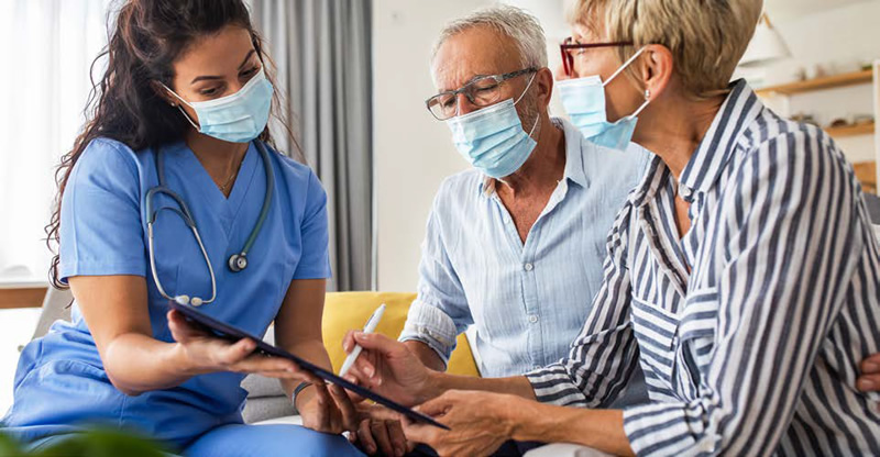 nurse discussing options with a patient and family