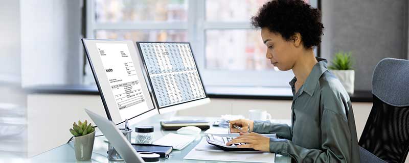 woman working on laptop at desk