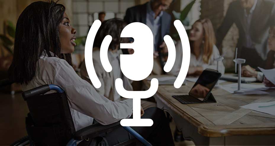 woman in wheelchair at a meeting