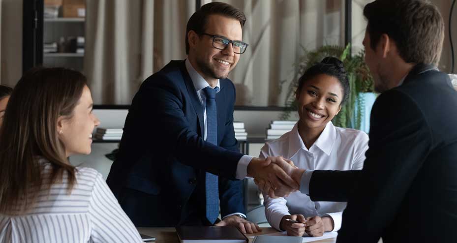 coworkers shaking hands