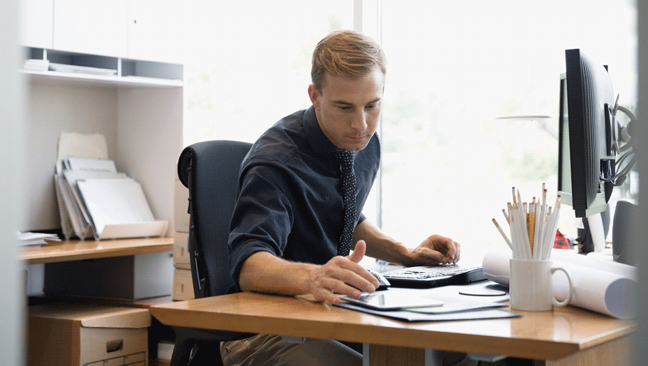 business owner looking at paperwork