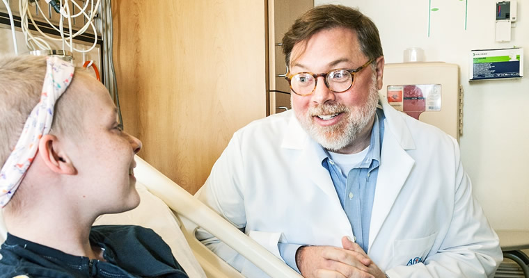 doctor sitting with patient