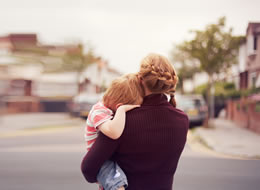 mother holding a child