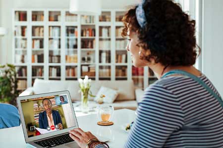 two women having a virtual meeting
