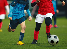 children playing a soccer game