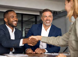 co-workers shaking hands