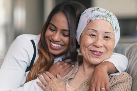 Two women hugging