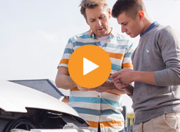 two men exchanging information after auto accident