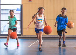 children playing basketball