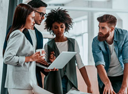 three employees working together