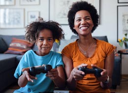 mother and child playing videogames