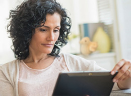 woman looking at laptop