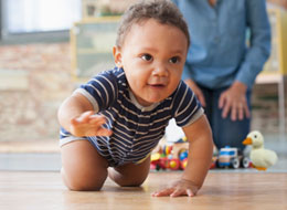 baby crawling on floor