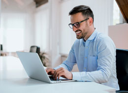 man working on laptop