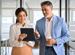 woman looking at tablet