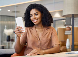 woman looking at phone