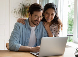 couple looking at laptop