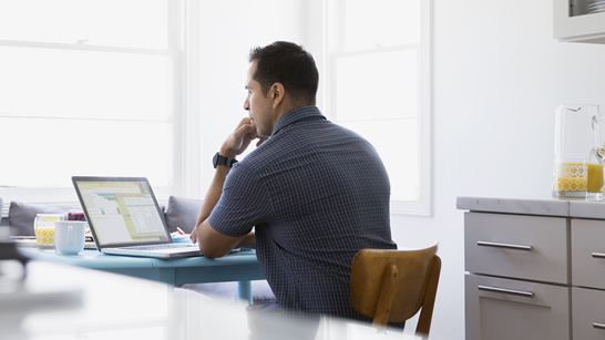 man using a laptop computer