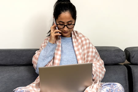 two people looking at a mobile device