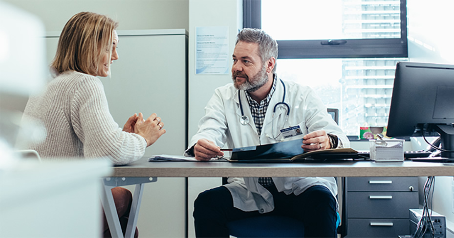 doctor and patient discussing treatment plans.