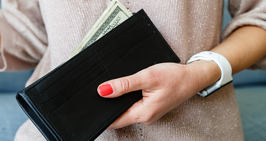 woman holding wallet