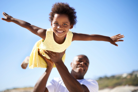 father playijng with his daughter