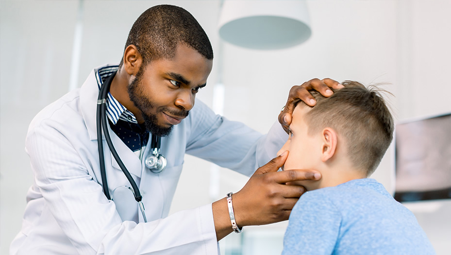 optometrist conducting an eye exam