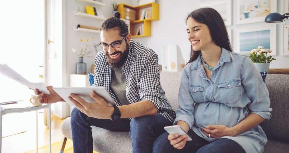 couple looking at a tablet computer