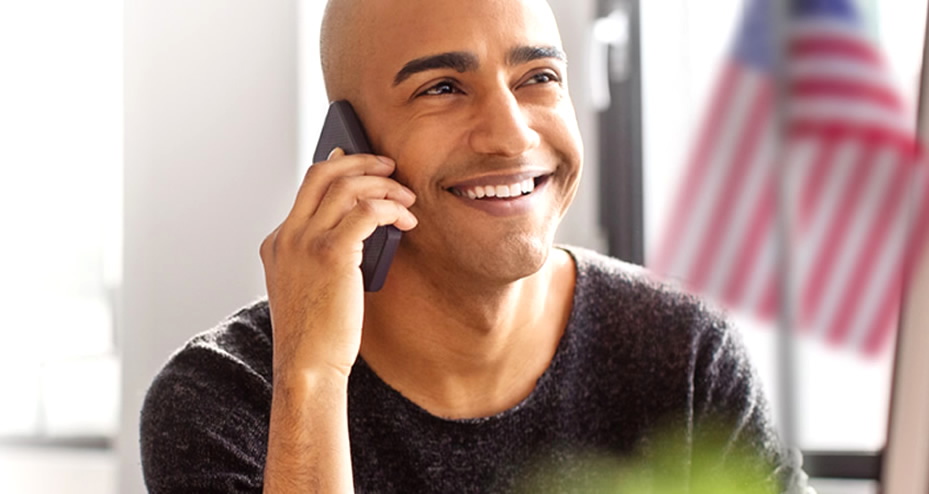 former servicemember using a mobile phone