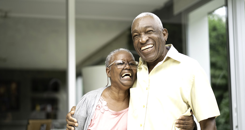 older couple hugging and smiling