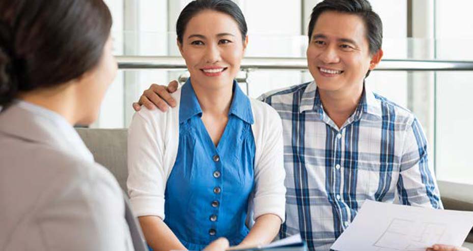 couple sitting with advisor