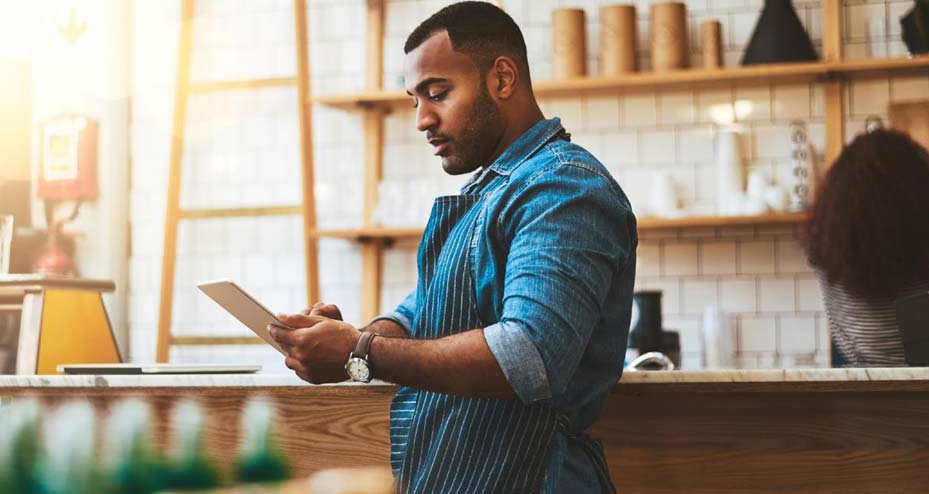 man working on tablet