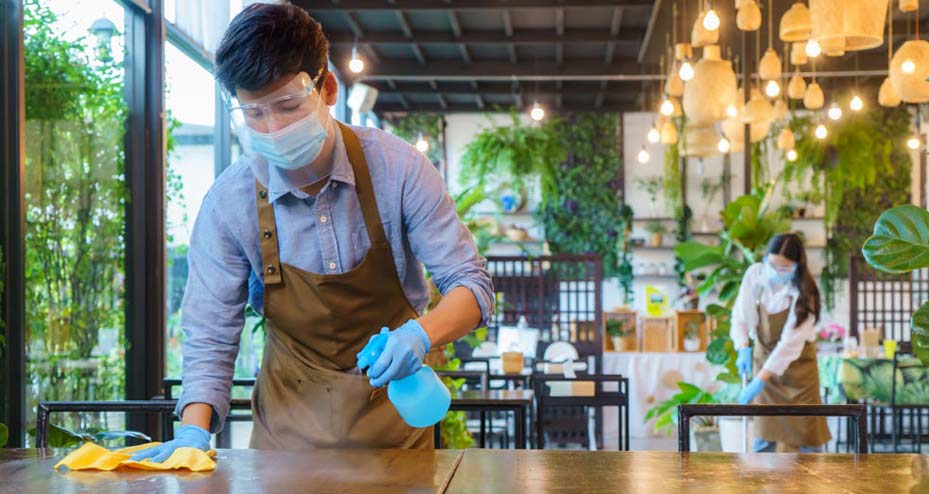 employees cleaning restaurant