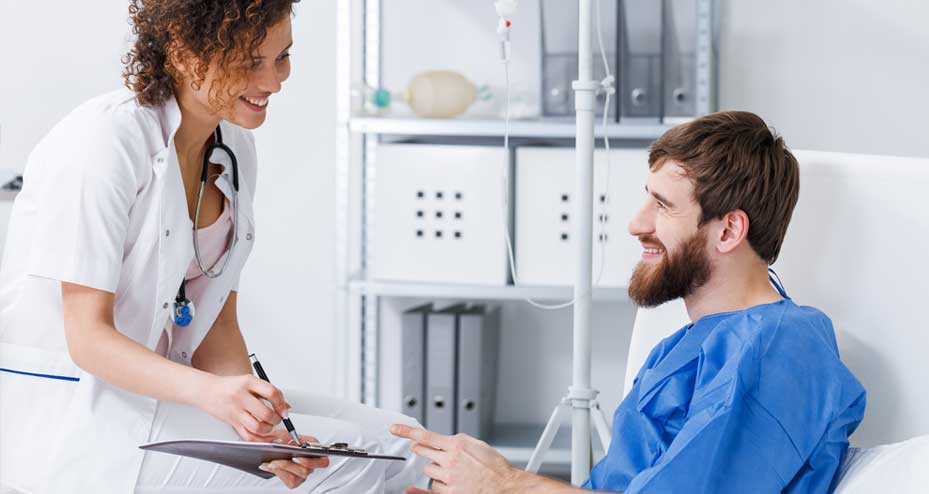 nurse reviewing documents with a patient