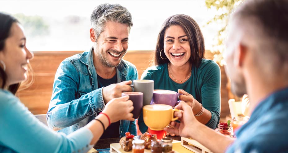 family having coffee and snacks