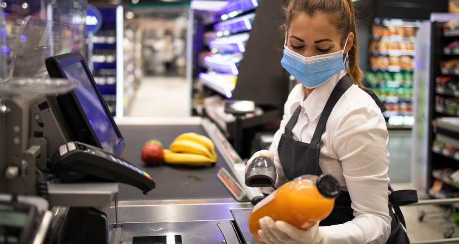 masked grocery cashier