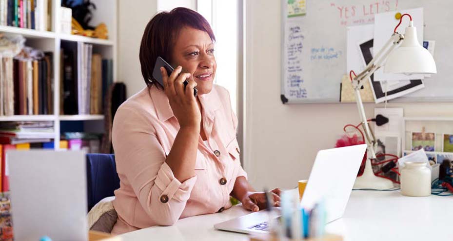 woman working and talking on phone