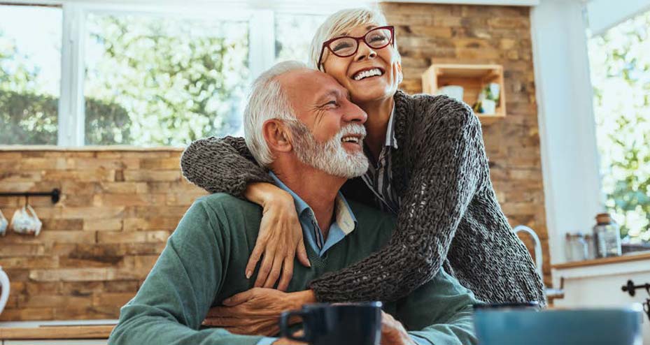 older couple hugging