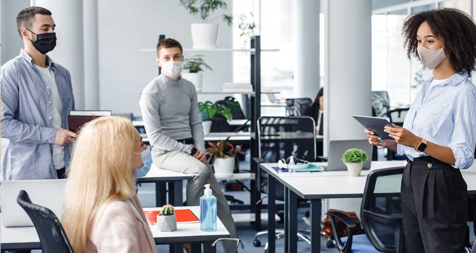 employees chatting in conference room