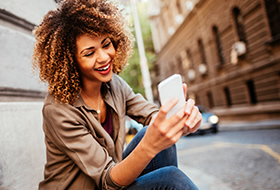 woman using cellular phone