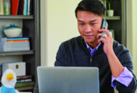 man using a laptop computer